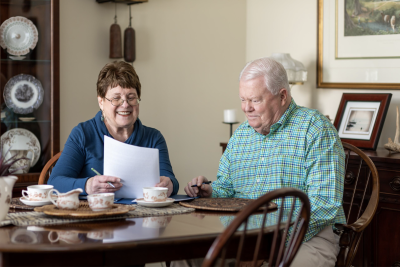 senior couple reviewing paperwork